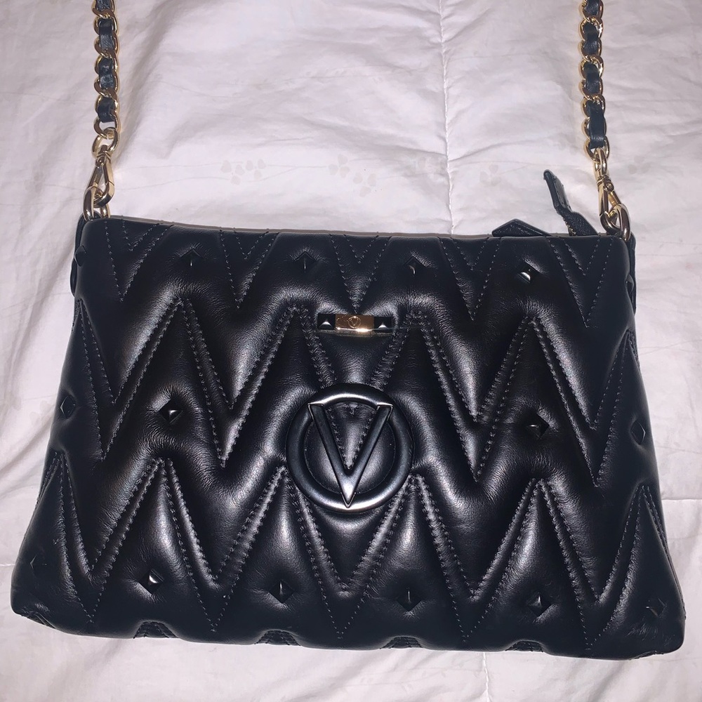 Like new gently used Valentino Vanille Studs Quilted Purse by Mario Valentino.